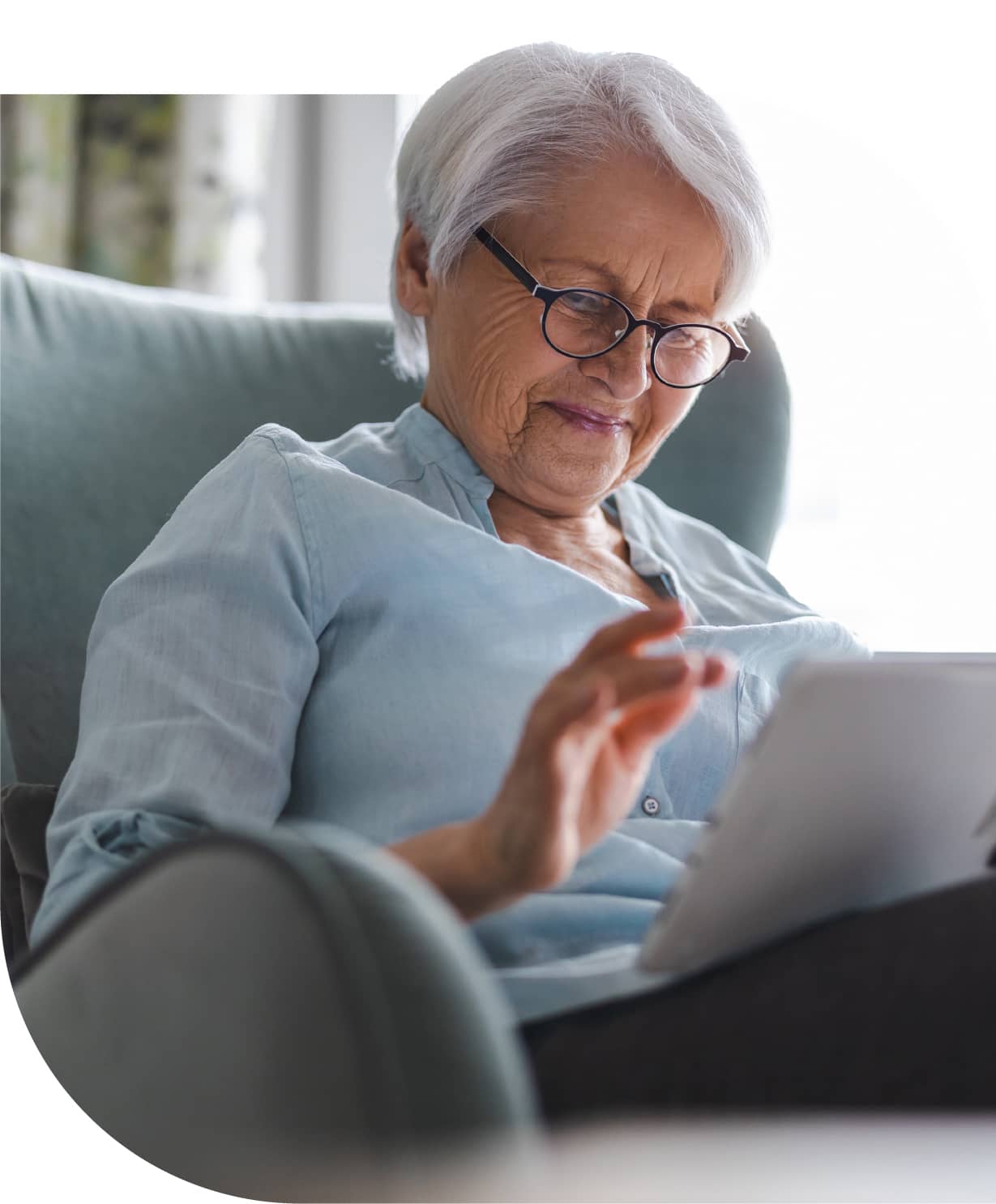 Photo: Older woman using a tablet