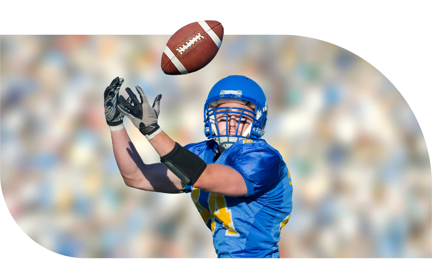 Football player catching the ball