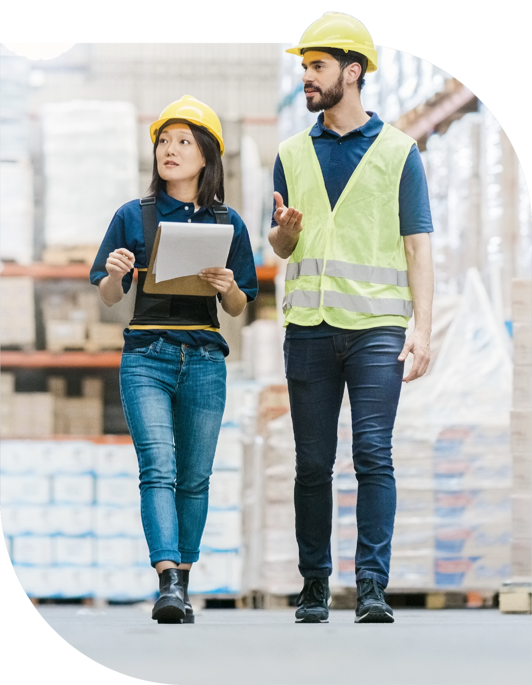 Workers checking inventory in warehouse
