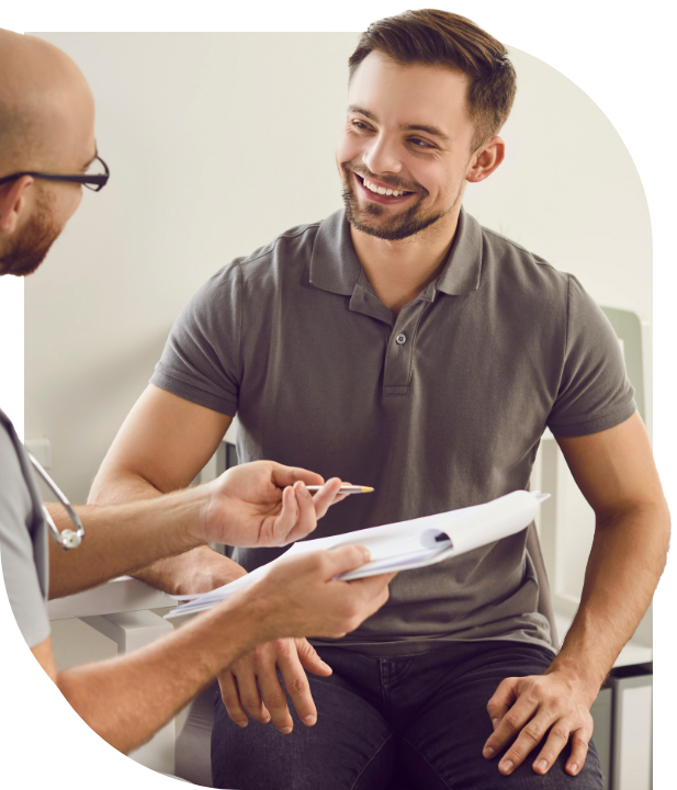 Photo: Physician talking with patient