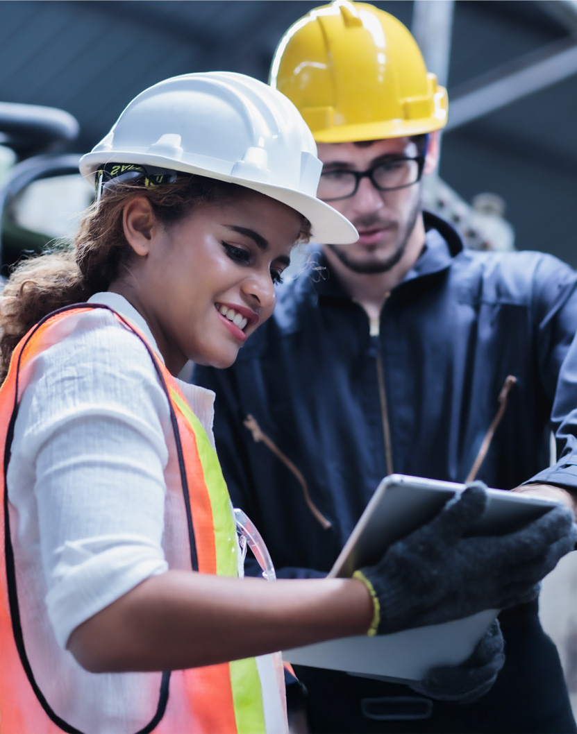 Two workers with construction hats